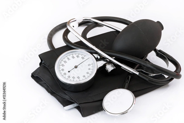 Fototapeta Analoges Blutdruckmessgerät mit schwarzer Manschette