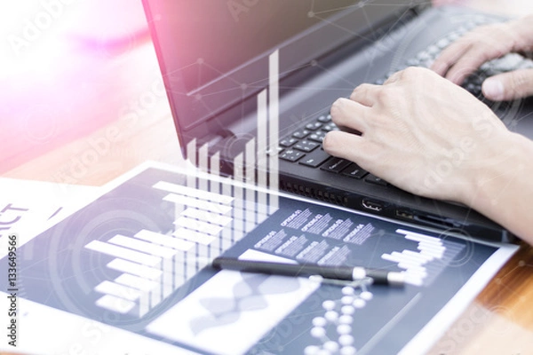 Fototapeta businessman hand working with new modern computer and business s