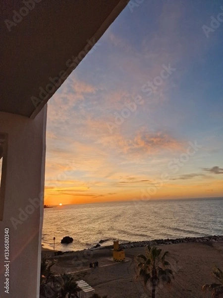 Obraz Tranquil Sunset Over a Palm-Fringed Beach