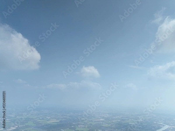 Obraz The River's Embrace: An Aerial Glimpse of little town Urban Heart. This drone photograph captures a wide aerial view of Nakhon Pathom, Thailand, with a focus on the river that flows through town