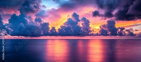 Fototapeta Vibrant sunset over calm ocean