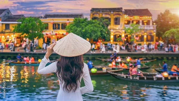 Fototapeta Asian woman wearing vietnam culture traditional at Hoi An ancient town,Hoi an city in Vietnam.