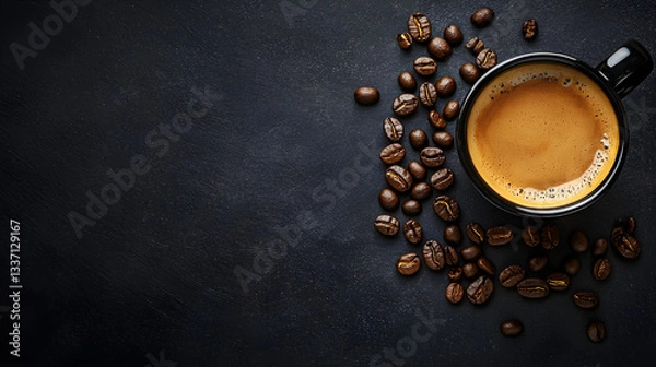 Fototapeta Cup of Coffee with Roasted Beans on Dark Background, Minimalist Composition with Copy Space for Cafe or Coffee Branding, Top View Layout