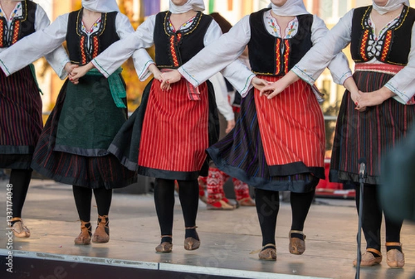 Obraz Authentic balkan folk dance on stage at Busojaras - March 4, 2025 Mohacs, Hungary