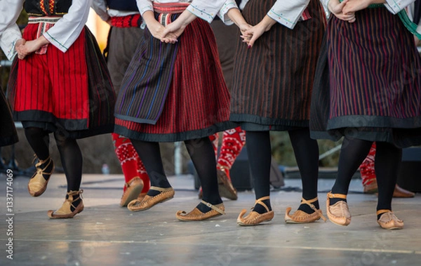 Obraz Authentic balkan folk dance on stage at Busojaras - March 4, 2025 Mohacs, Hungary