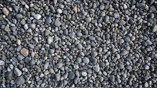 Fototapeta Textured pebble background for nature or landscaping projects. Perfect for earth and stone designs.