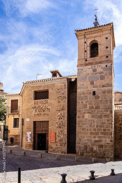 Fototapeta Church of El Salvador (Mezquita-Iglesia de El Salvador) medieval building, a former mosque with minaret tower, Toledo, Spain.