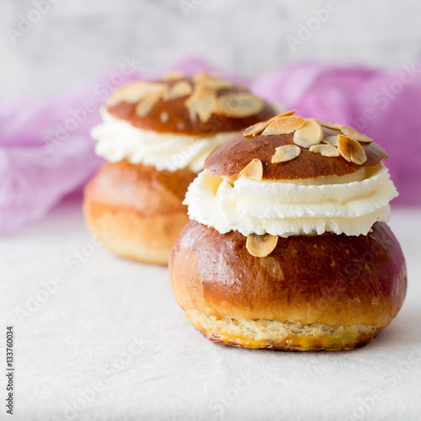 Obraz Fresh baked homemade buns on the table for breakfast Baking traditional Swedish semla bread