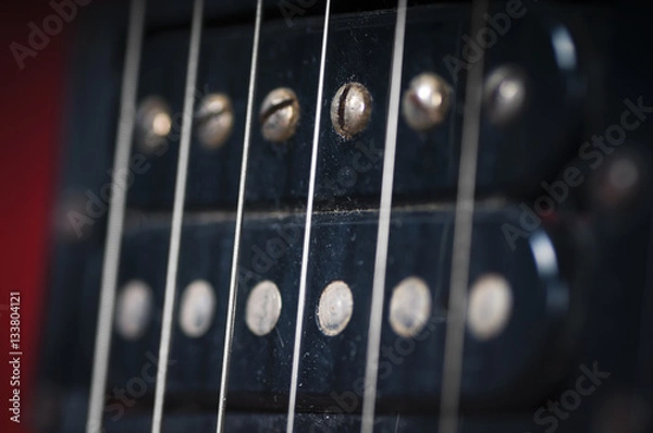 Fototapeta The pickups on the old electric guitar