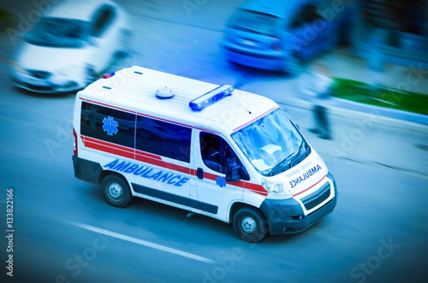 Obraz Ambulance van with flashing lights