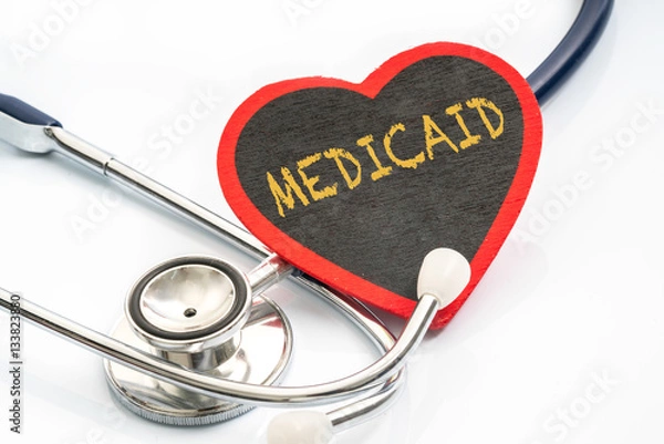 Fototapeta stesthoscope with red heart shape - medical concept