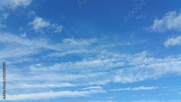 Obraz blue sky with white clouds