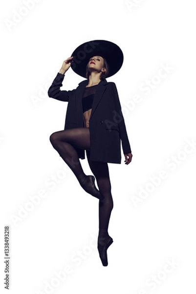 Fototapeta ballerina in the style of fashion total black in a jacket and hat poses ballet elements, isolated on transparent background, png