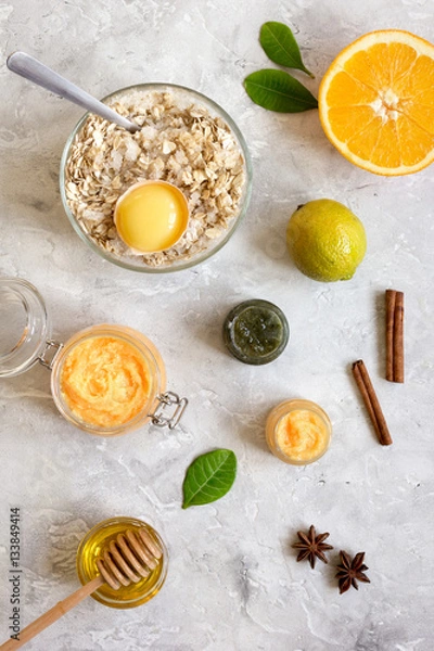 Fototapeta organic citrus scrub homemade on gray background top view
