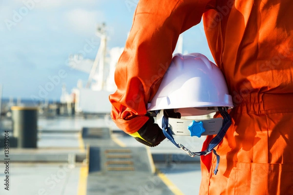 Obraz Orange robe engineer on the deck.