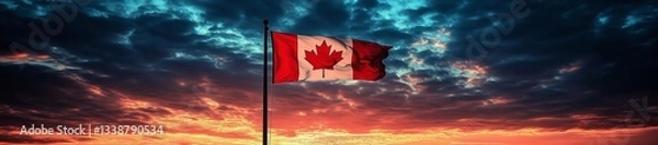 Fototapeta A dramatic sunset with a Canadian flag in the foreground gently waving in the wind. Generative AI