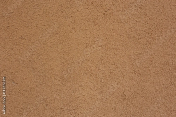 Fototapeta Soil wall texture of clay house structure. Mud background. 