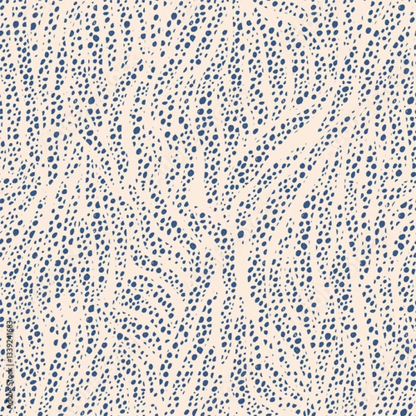 Fototapeta Abstract pattern with irregular blue dots on a light beige background, creating a flowing, dynamic texture. The design evokes a sense of movement and organic forms in nature.