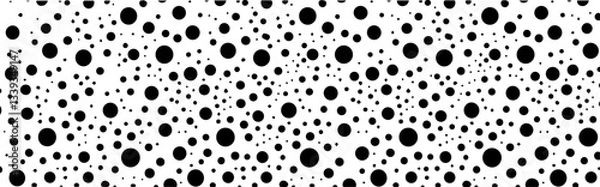 Fototapeta seamless black and white polka dot pattern with randomly scattered circles in varying sizes