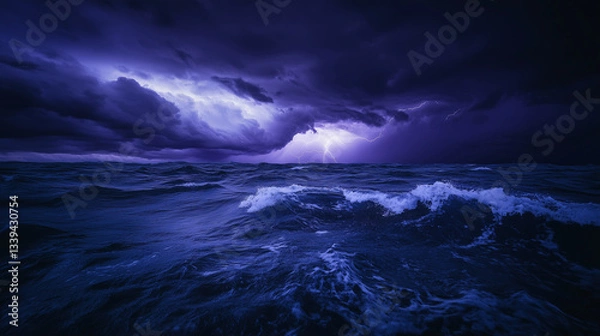 Fototapeta A dark and moody seascape where a swirling storm looms over the ocean, with an eerie purple glow from lightning strikes in the distance