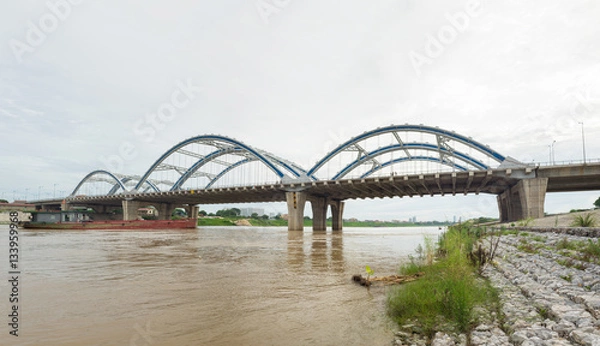 Fototapeta Dong Tru bridge crossing Red River in Hanoi, Vietnam