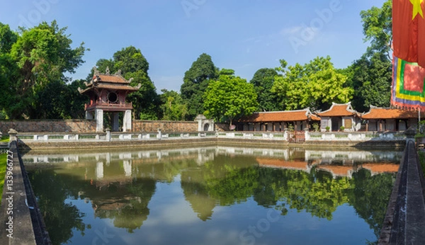 Fototapeta Panorama view of third courtyard in ancient Temple of Literature (Van Mieu), with the Thien Quang well and the red Khue Van pavilion, two great halls which house the treasures of the temple