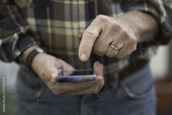Fototapeta Man Pointing to iPone