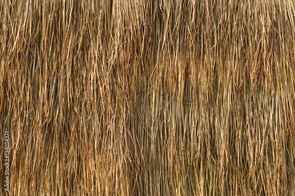 Fototapeta bale of hay background as an agriculture farm dried grass straw