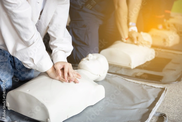 Obraz People use CPR training manikin