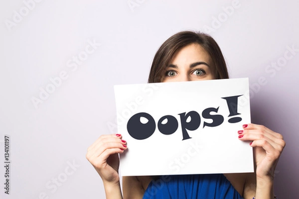 Fototapeta Girl with a Oops! expression drawn on paper