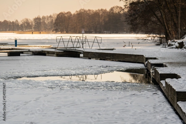Obraz winter swimming - water hole - perfect refreshment after sauna