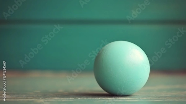 Fototapeta Single teal egg on rustic wood.