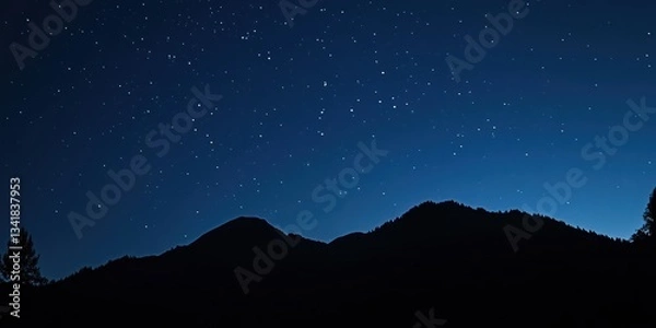 Fototapeta Stunning night landscape featuring the bright Milky Way galaxy over majestic mountains. A breathtaking starry sky perfect for nature, astronomy, and adventure themes.