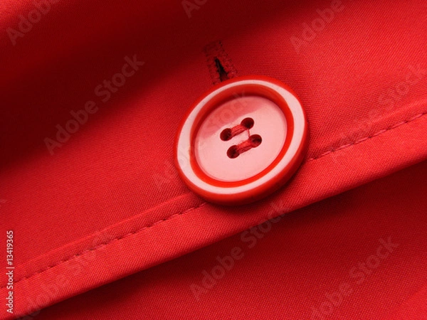 Fototapeta red closes fragment with button