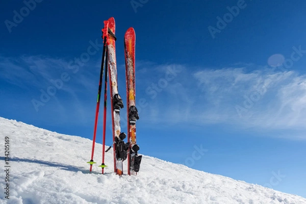 Obraz Ski equipment on mountain background