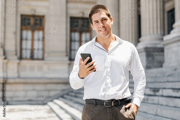 Fototapeta Professional man smiling while discussing business outdoors. copyspace