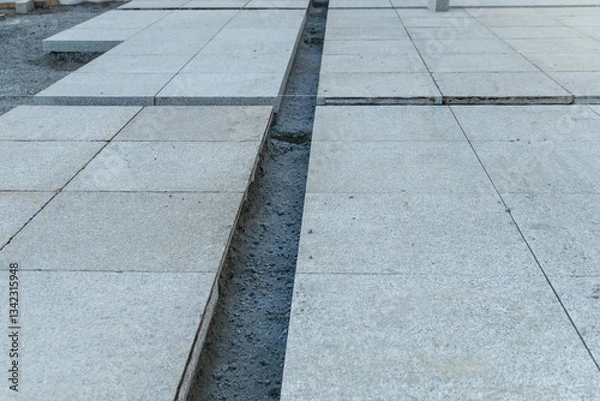 Fototapeta Concrete pavement under construction.