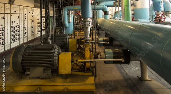 Fototapeta several water pumps with electric motors