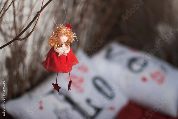 Obraz Red angel with star on a love pillow