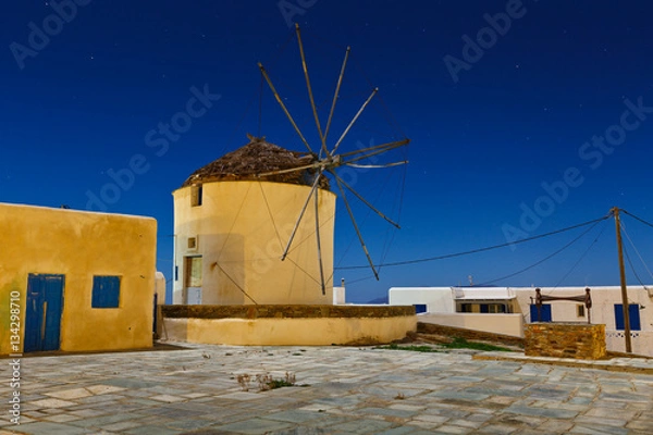 Fototapeta Windmill in the main village on Ios island.