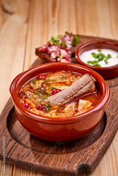 Fototapeta ribs with cabbage and sauce