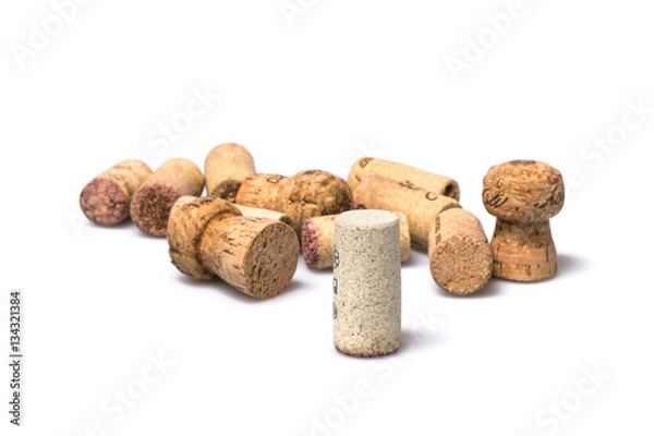 Fototapeta Various wine corks isolated on white background. Focus on the closest cork.