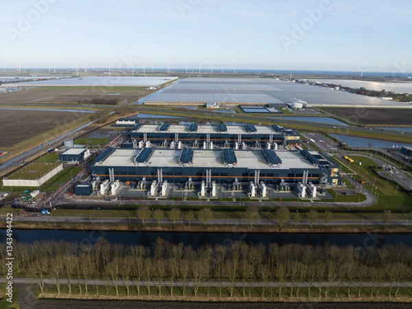 Obraz Aerial drone views of a supercomputer data center, artificial intelligence, and internet infrastructure in the Netherlands. Big data, quantum computing, supercomputer.