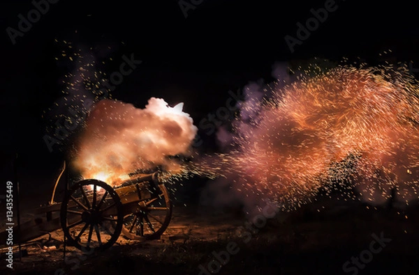 Fototapeta Cannon blast with sparkles