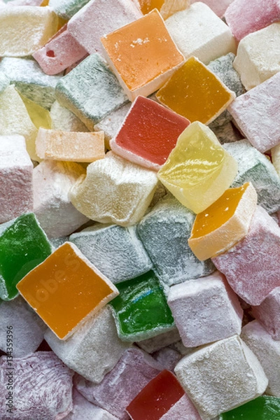 Fototapeta Turkish delight in various colors as background