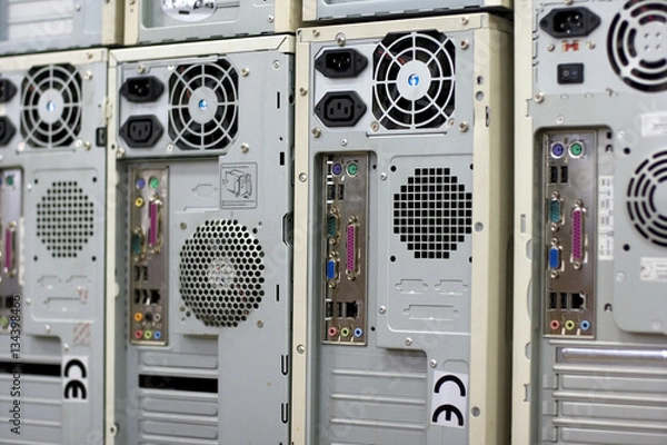 Fototapeta Rows of back lanes of standard desktop computers with various connectors
