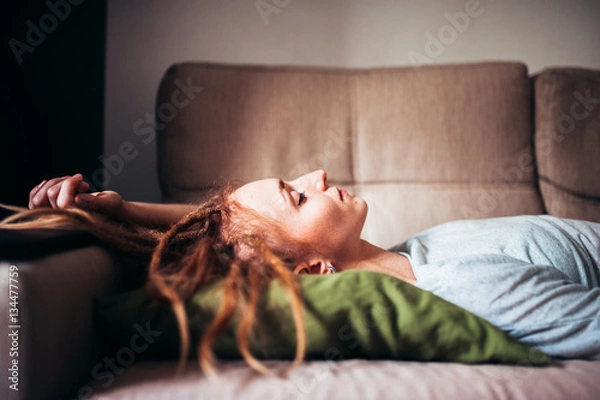 Fototapeta red-haired girl with dreadlocks