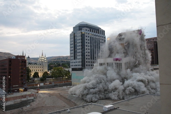 Fototapeta Building demolition with explosives	in downtown city location