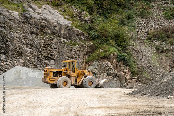 Fototapeta Yellow Front-End Loader at a Rocky Site