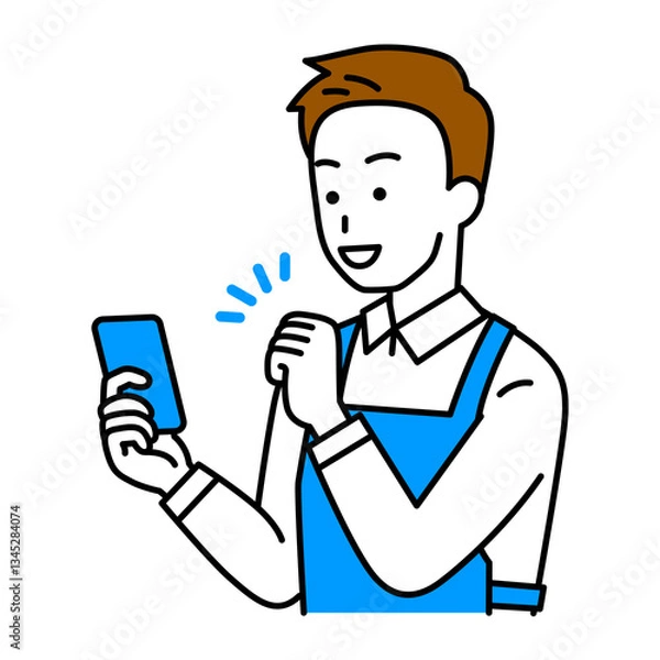 Fototapeta スマートフォンの画面を見てガッツポーズで喜ぶエプロン姿の男性